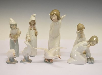 Lot 416 - Five Lladro figures and three geese