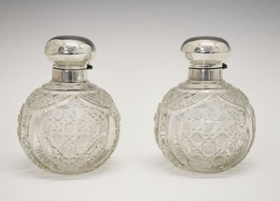 Lot 121 - Pair of Elizabeth II silver mounted scent bottles
