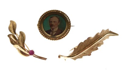 Lot 67 - 9ct gold leaf design brooch, and two unmarked yellow metal brooches