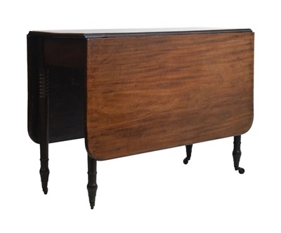 Lot 668 - Mahogany drop leaf table