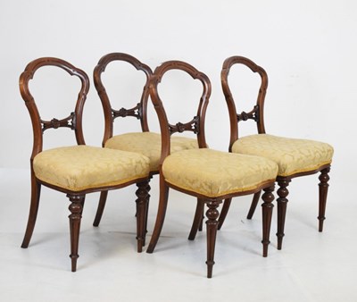 Lot 711 - Set of four Victorian walnut buckle back dining chairs