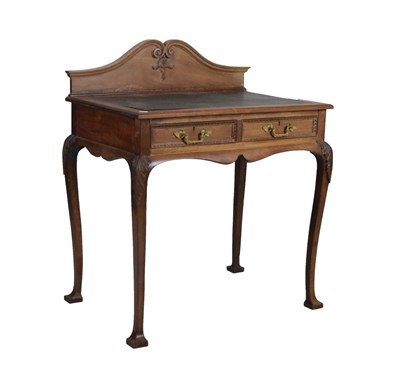 Lot 663 - Early 20th Century mahogany writing table