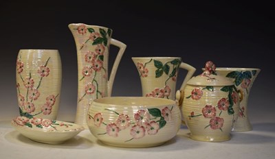Lot 448 - Maling biscuit barrel, jug, waisted vase and bowl, plus boat