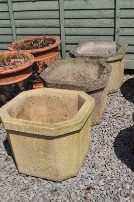 Lot 792 - Three octagonal composite stone garden planters