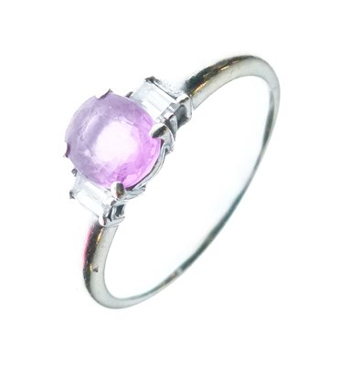 Lot 8 - Pink sapphire and baguette cut diamond three-stone ring