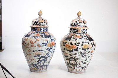 Lot 301 - Pair of Imari lidded vases