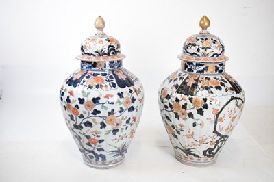 Lot 301 - Pair of Imari lidded vases