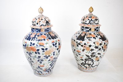 Lot 301 - Pair of Imari lidded vases