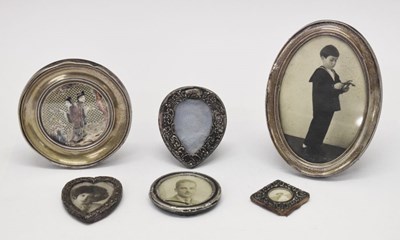 Lot 197 - George V silver oval frame and other frames