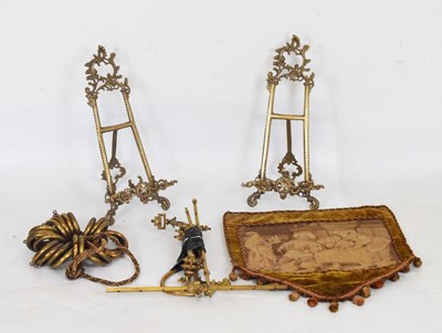 Lot 690 - Brass easels, curtain hooks, etc.