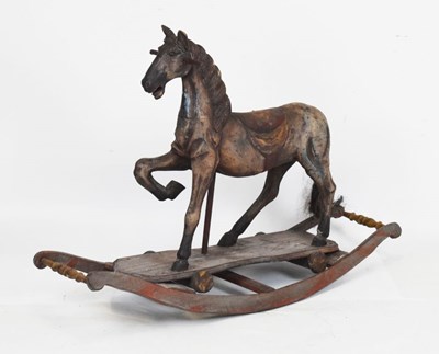 Lot 244 - Carved painted wooden horse