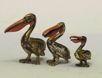 Lot 171 - Three graduated silver and enamel models of Pelicans