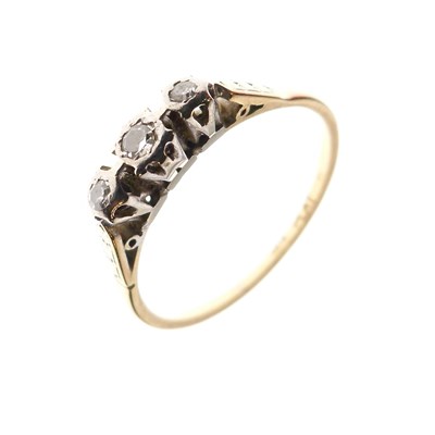 Lot 5 - Yellow metal (18ct and Plat) ring set three diamonds