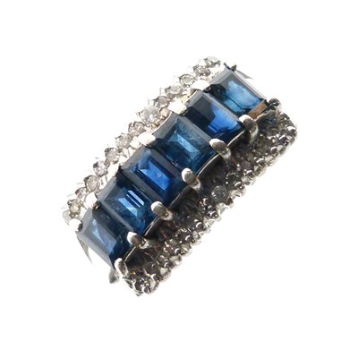Lot 14 - White metal (14K) sapphire and diamond ring