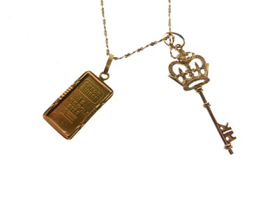 Lot 99 - Fine gold ingot pendant, and key pendant on chain