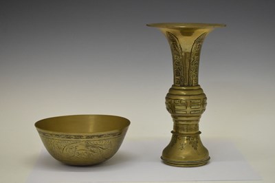 Lot 658 - Chinese bronze 'gu' vase, and brass bowl