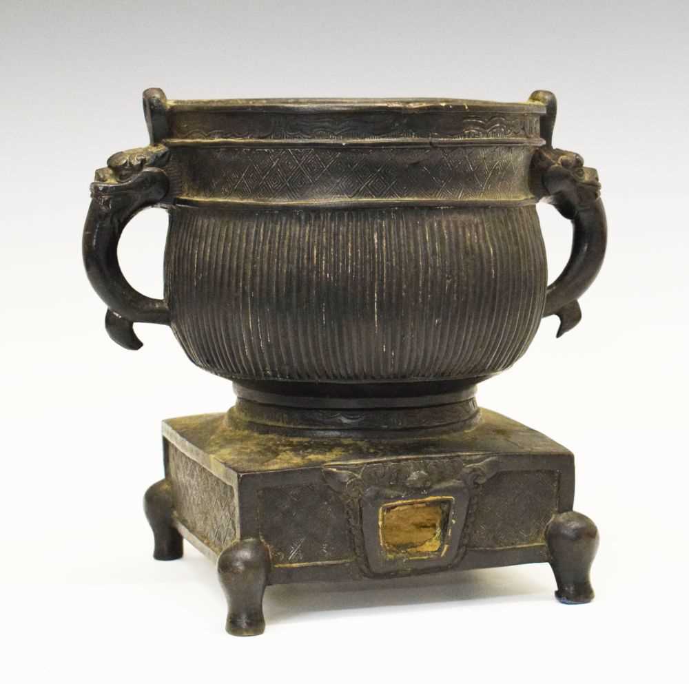 Lot 484 - A good Chinese bronze ritual food vessel on stand (Gui)