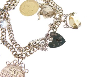Lot 33 - 9ct gold charm bracelet