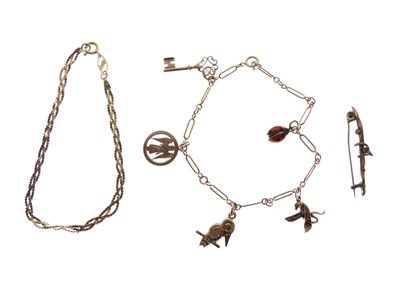Lot 116 - Charm bracelet, indistinctly stamped, bar brooch stamped '9ct'