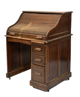 Lot 544 - Oak tambour-top desk