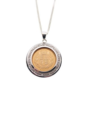 Lot 100 - Royal Mint Limited Edition 2002 half sovereign in 9ct white gold diamond-set pendant