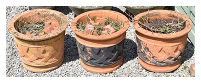 Lot 668 - Set of three terracotta planters