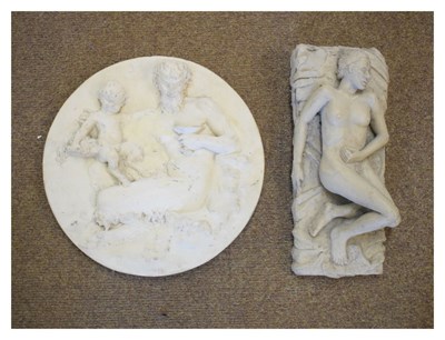 Lot 503 - Plaster roundel depicting a satyr, together with a reclining figure