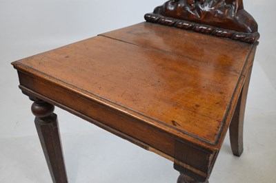 Lot 721 - Pair of Victorian carved oak armorial hall chairs