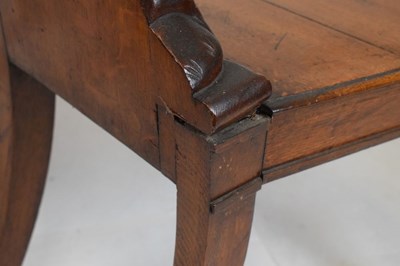 Lot 721 - Pair of Victorian carved oak armorial hall chairs
