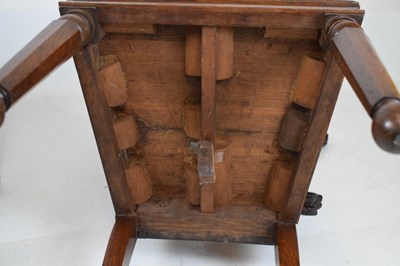 Lot 721 - Pair of Victorian carved oak armorial hall chairs