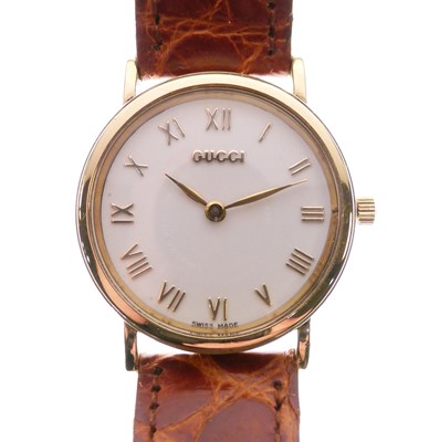 Lot 221 - Gucci - Lady's gold-plated fashion watch