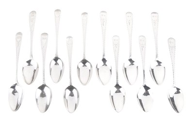 Lot 92 - Set of six George III silver teaspoons with bright cut decoration