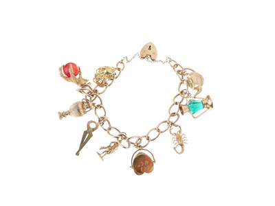 Lot 124 - 9ct gold charm bracelet
