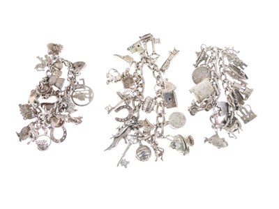 Lot 129 - Three silver charm bracelets