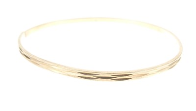 Lot 109 - 9ct gold bangle