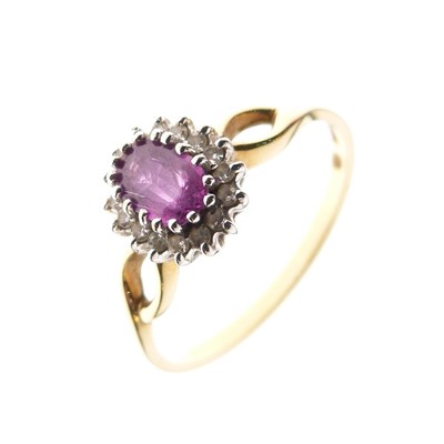 Lot 21 - 18ct gold, ruby and diamond cluster ring