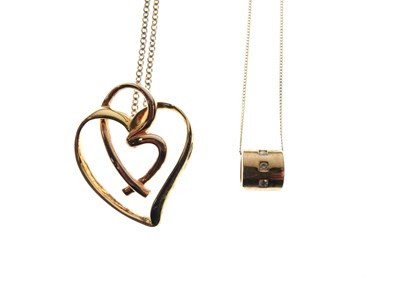 Lot 93 - 9ct gold pendant set three brilliant-cut diamonds