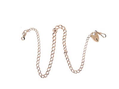 Lot 77 - 9ct gold graduated curb-link watch chain with padlock