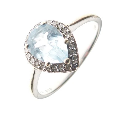 Lot 19 - 9ct white gold dress ring set pear cut blue topaz and diamonds
