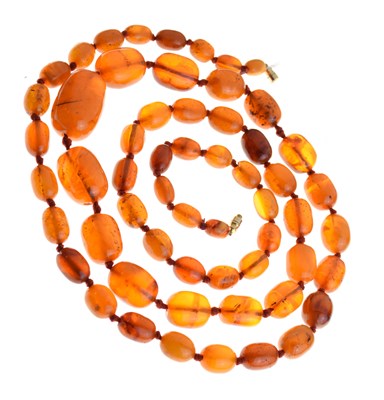 Lot 80 - Graduated row of amber beads
