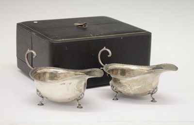 Lot 96 - George V cased pair of silver sauceboats, London 1916