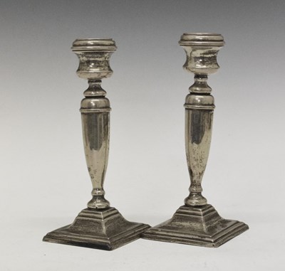 Lot 97 - Pair of George V silver candlesticks