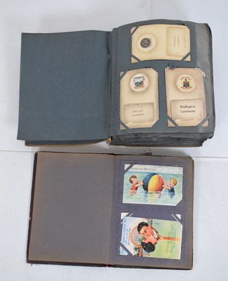 Lot 141 - Two albums of early 20th Century postcards
