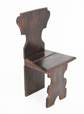 Lot 518 - Oak plank chair, carved  'AM 1647'