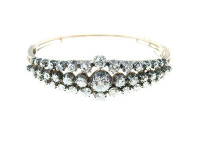 Lot 12 - Victorian diamond hinged bangle