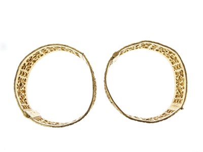 Lot 17 - Pair of hinged bangles