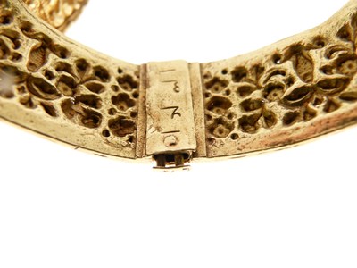 Lot 17 - Pair of hinged bangles
