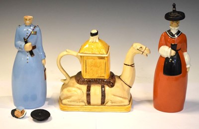 Lot 354 - Two Roby, Paris figural decanters and a camel teapot
