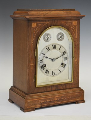 Lot 352 - Hamburg American Clock Co - German inlaid oak cased mantel clock
