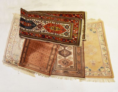 Lot 340 - Two Chinese rugs, a runner and two machine made rugs (5)